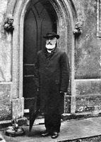 Revd Alexander Woodforde outside the chancel door at Locking Parish Church (1901)